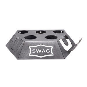 May include: A gray metal can holder with six circular cutouts and a hook on the side. The holder has the word "SWAG" printed on the front.