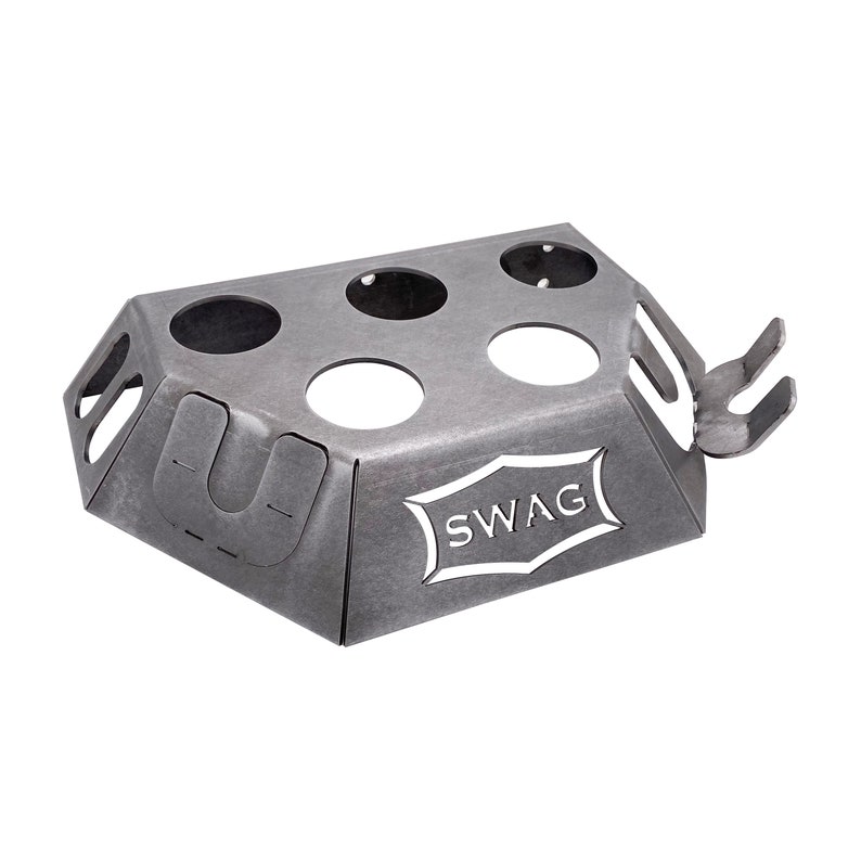 May include: A metal can holder with five circular cutouts and a "SWAG" logo. The holder has a U-shaped handle on the side and a hook on the top.