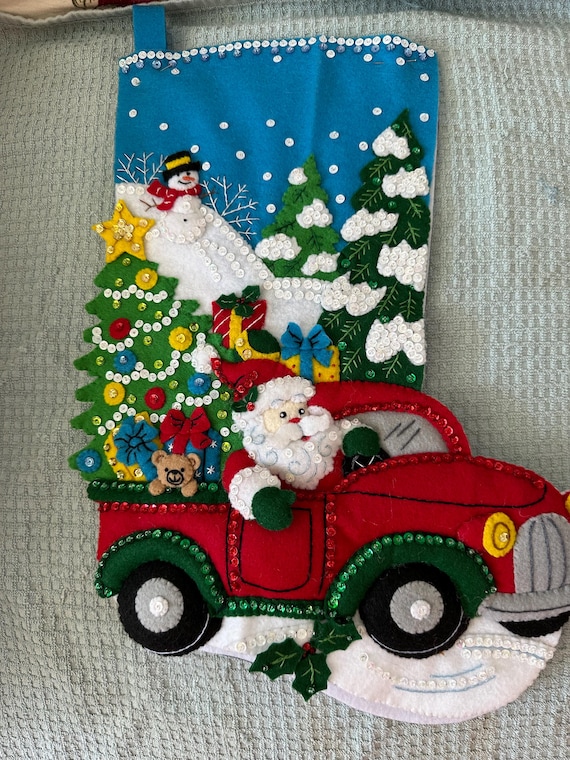 This an 18" Bucilla "Santa's Drive" Christmas stocking