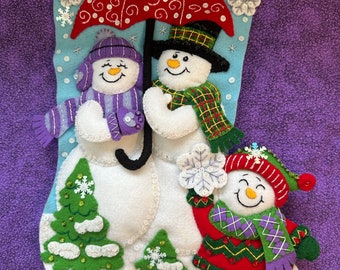 This is handmade finished Bucilla “Frosty Family “ stocking