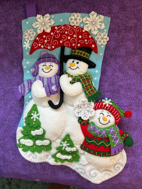 This is handmade finished Bucilla “Frosty Family “ stocking