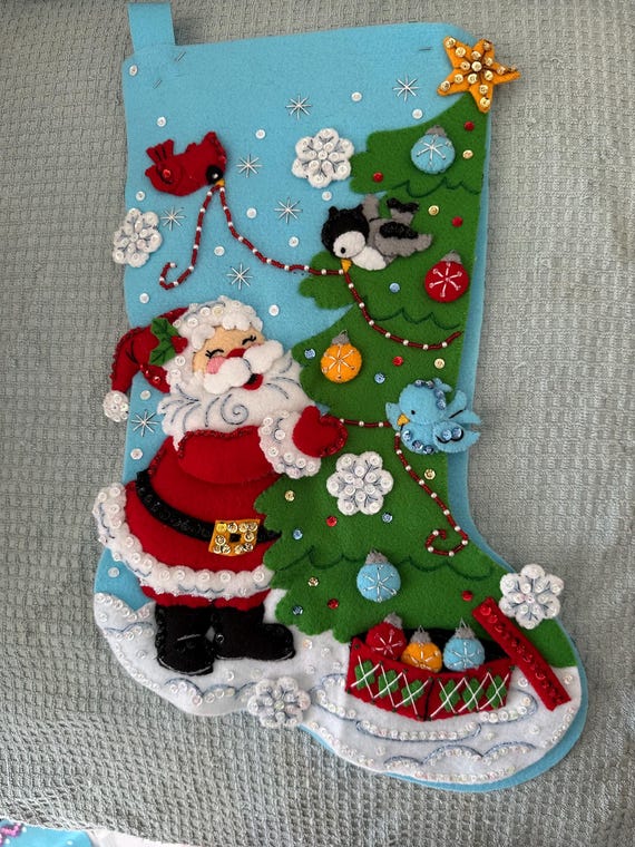 This is a Bucilla "Trimming the Tree with Tweets" Christmas Stocking