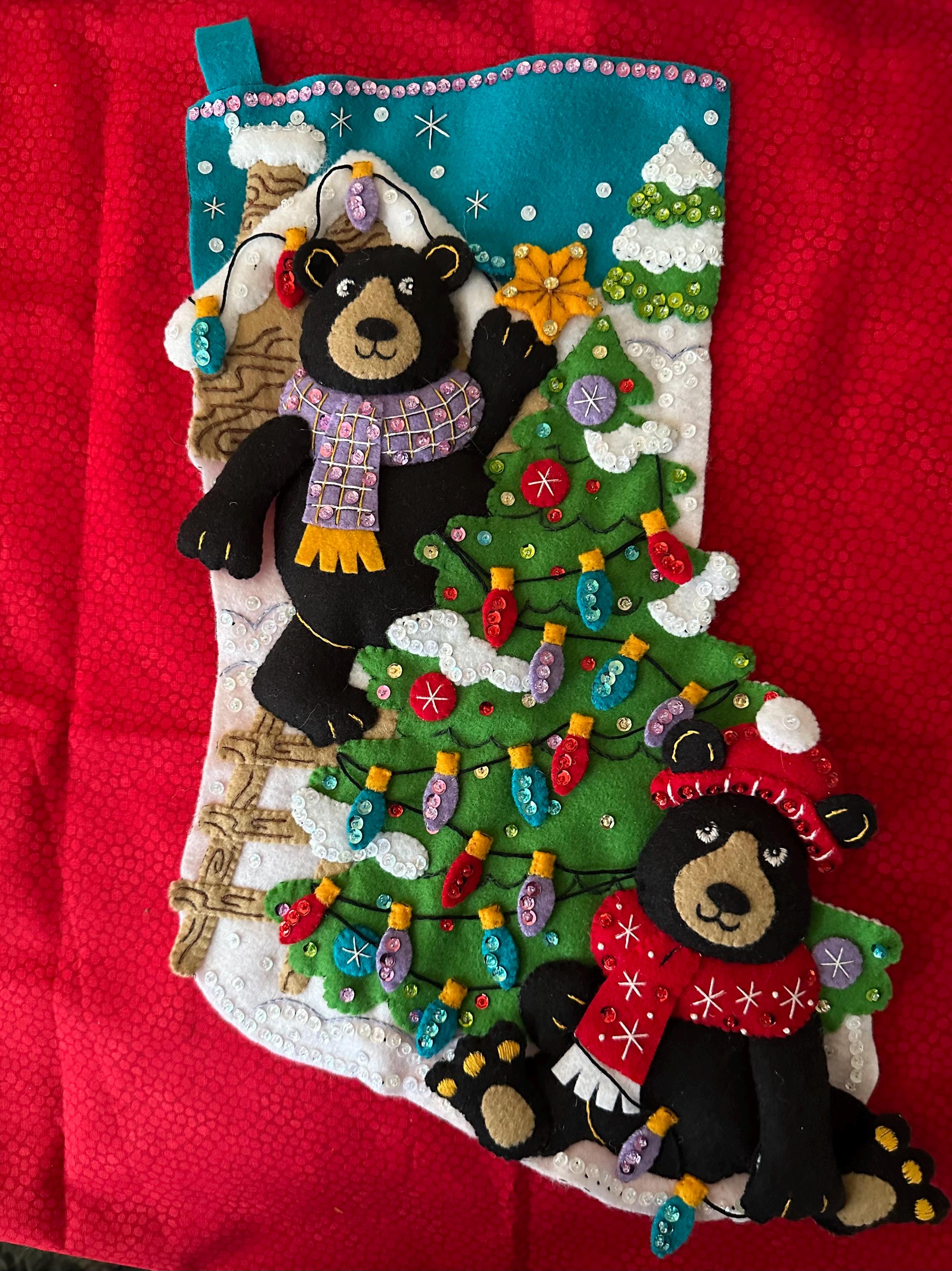 A finished 18" Bucilla "Holiday Black Bears"
