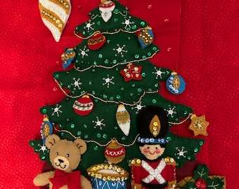 This is a handmade finished Bucilla “Under the Tree” stocking