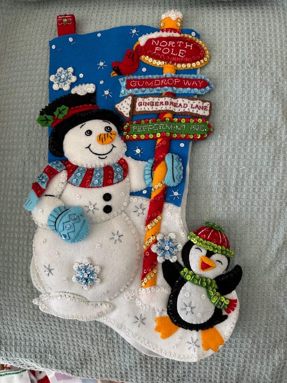 This is an 18" Bucilla "Destination North Pole" Christmas stocking