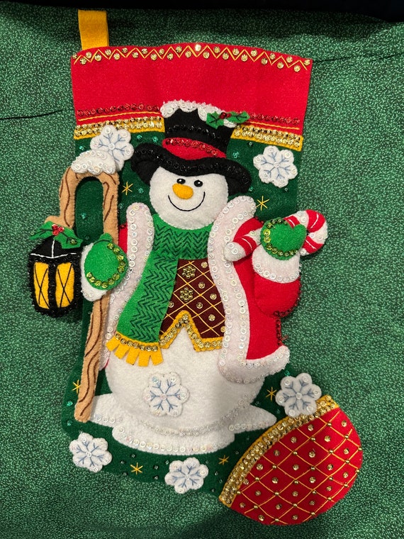 This is a handmade finished Bucilla “ light up the holidays”