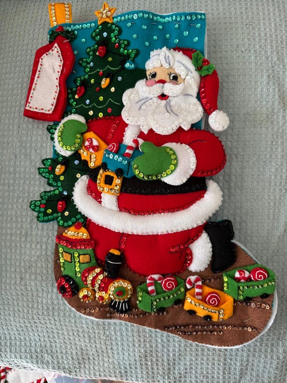 This is an 18" Bucilla "Santa and trains" Christmas stocking