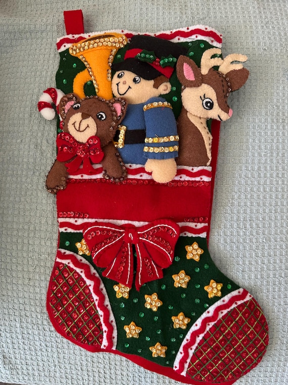 This is an handmade 18"  Bucilla "Holiday Toy Treasures Christmas Stocking