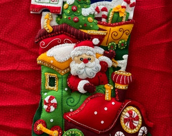 This is a finished Bucilla "Santa Peppermint express" stocking