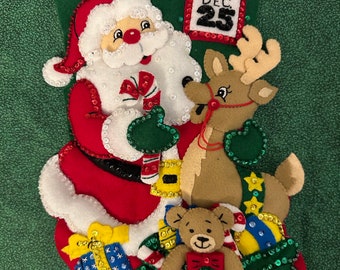 This is a handmade finished Bucilla “Santa and Friends “ stocking