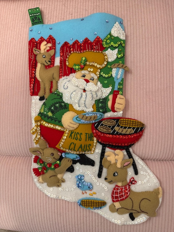This is an 18" Bucilla "Grilling Santa" Christmas stocking