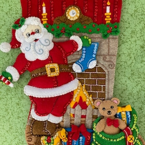 Finished Bucilla Christmas stocking “Fireplace Santa”