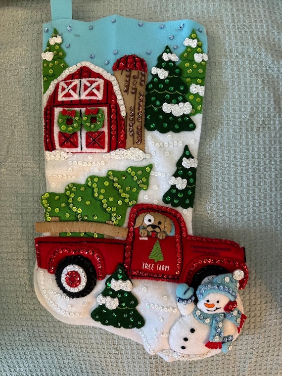 This is an 18" Bucilla "Christmas at the Farm" Christmas stocking