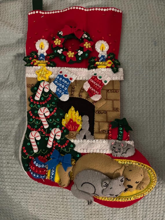 This is an 18" Bucilla "Holiday Hearth" Christmas stocking