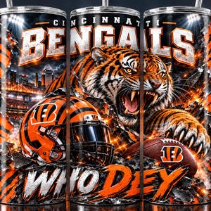 May include: A cylindrical tumbler featuring a Cincinnati Bengals graphic with a roaring tiger, a football helmet, a football, and the text "CINCINNATI BENGALS" and "WHO DEY" set against a stadium background with orange and black tiger stripes.