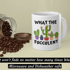 May include: White ceramic coffee mug with a black and green cactus design and the text "WHAT THE FUCCULENT". The mug is microwave and dishwasher safe.