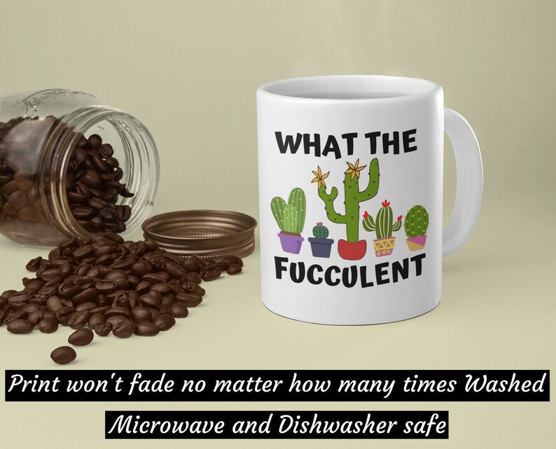 May include: White ceramic coffee mug with a black and green cactus design and the text "WHAT THE FUCCULENT". The mug is microwave and dishwasher safe.