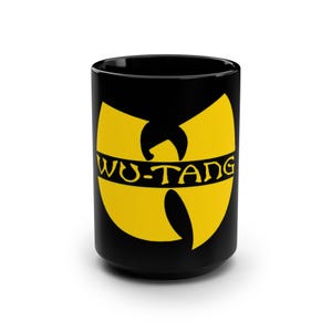 May include: Black ceramic mug with a yellow Wu-Tang Clan logo. The logo is a stylized 'W' with the text 'WU-TANG' across the middle.