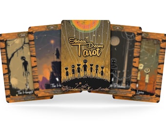 May include: A set of tarot cards with a gold and brown background. The cards feature illustrations of stick figures and the text "Ethereal Dreams Tarot".