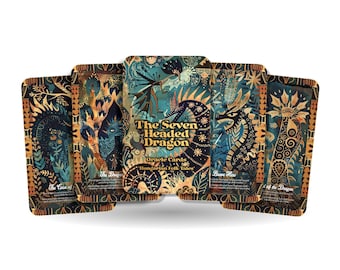 May include: A set of seven oracle cards featuring colourful illustrations of dragons and other mythical creatures. The cards are titled "The Seven Headed Dragon Oracle Cards" and feature the text "Hungarians Folk Tales".