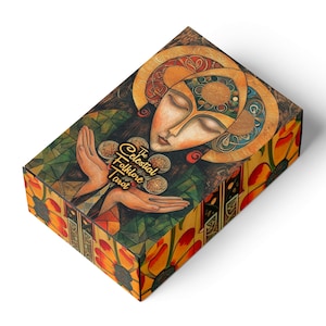 May include: A tarot card box with a detailed illustration. The box features a woman's face with a halo, hands holding coins, and the text "The Celestial Folklore Tarot". The design incorporates earthy tones and geometric patterns.