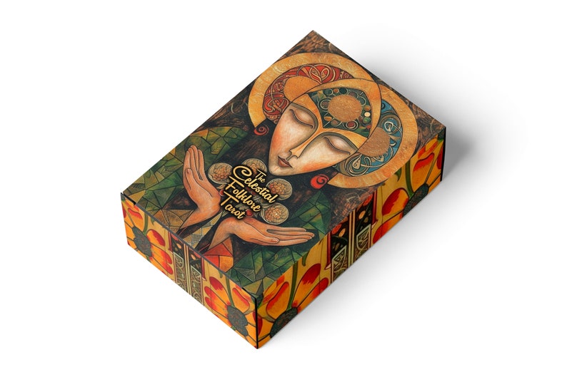 May include: A tarot card box with a detailed illustration. The box features a woman's face with a halo, hands holding coins, and the text "The Celestial Folklore Tarot". The design incorporates earthy tones and geometric patterns.