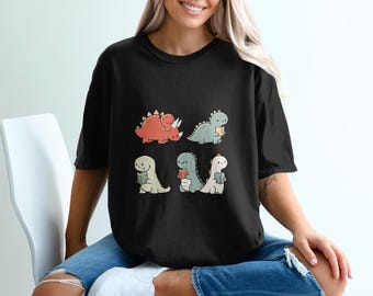 Maglietta Comfort Colors® con simpatico dinosauro che legge / Maglietta per amanti dei libri, regalo per amanti dei dinosauri, maglietta comoda per i lettori / Maglietta Comfort Colors