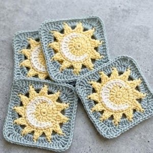 May include: A set of three ceramic mugs with a speckled, matte finish. The mugs are in shades of cream, light gray, and dark gray. Each mug has a simple, minimalist design, perfect for coffee or tea.