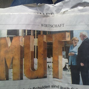 Sculpture MUT word sculpture made of steel letters by Hüseyin Arda Kunsthaus Tacheles garden sculpture outdoor large steel sculpture