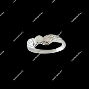 Winged Heart Ring
Angel Heart Ring
Sterling Silver Ring
Guardian Angel Ring
Dainty Silver Ring
Celestial Ring
Love Ring For Her
Spiritual Ring
Boho Heart Ring
Heart With Wing Ring
Protective Ring
Meaningful Ring
Womens Ring