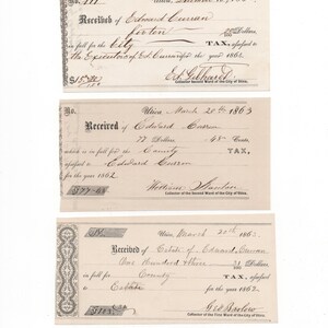 May include: Three vintage paper tax receipts from Utica, dated 1863 and 1864. Each document features handwritten cursive text, printed borders, and signatures from tax collectors. The receipts detail payments for city and county taxes.