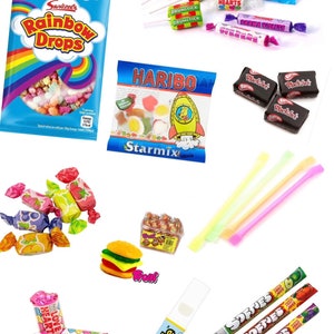 May include: Assortment of colorful candies and sweets in various packaging.  Includes rainbow drops, love hearts, drumstick lollipops, fizzy sweets, and gummy candies.  Also includes a whistle, a burger-shaped gummy candy, and a box of round candies.