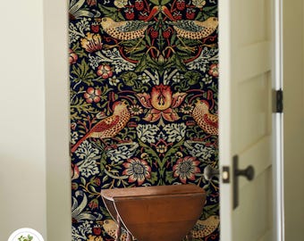 May include: A dark blue wallpaper with a repeating pattern of stylized birds, flowers, and leaves. The wallpaper is displayed on a wall in a room with a small wooden table in front of it.