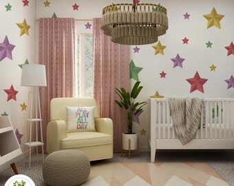 May include: A nursery with a white crib, yellow armchair, and a patterned rug. The walls are decorated with colorful star-shaped decals. A pillow on the chair reads "ALL PLAY ALL DAY". A large chandelier hangs from the ceiling.