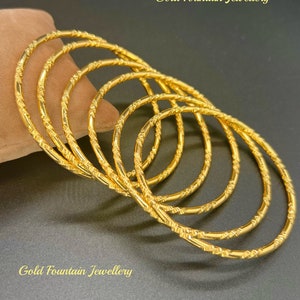 18K, 18Ct, 18 Carat, Set Of 6 Lady’s, Woman’s, Gold Filled Bangle, Size 2.6, Weight 61grams Ref:-315