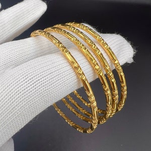 18K, 18Ct, 18 Carat, Set Of 4 Lady’s, Woman’s, Gold Filled Bangle, Size 2.6, Weight 41grams Ref:-315