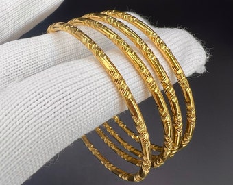 18K, 18Ct, 18 Carat, Set Of 4 Lady’s, Woman’s, Gold Filled Bangle, Size 2.6, Weight 41grams Ref:-315