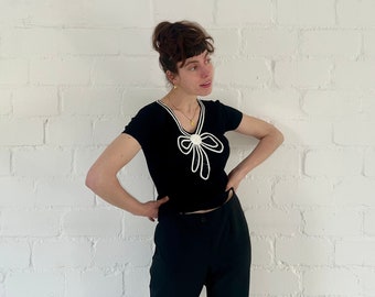 Haut en tricot à manches courtes vintage des années 90 avec motif arc et paillettes noires