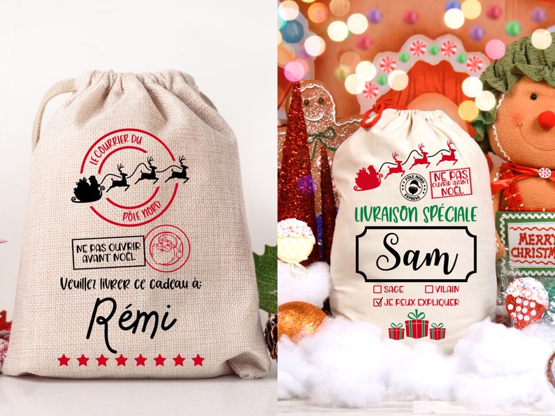May include: Two white canvas gift bags with red and black Christmas designs. The bag on the left says "Le Courrier du Pole Nord" and "Ne pas ouvrir avant Noel". The bag on the right says "Livraison Speciale Sam" and has a checkbox that says "Je peux expliquer".