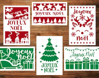May include: Six different Christmas stencil designs featuring a variety of holiday themes, including a Christmas tree, a reindeer, a sleigh, and the words "Joyeux Noel". The stencils are cut from white vinyl and are ready to be used on a variety of surfaces.