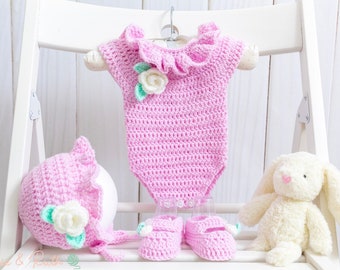 Crochet baby romper with cap and booties in pink colour