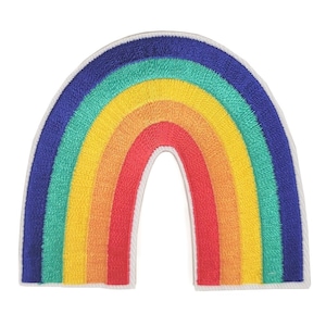 May include: A rainbow-colored embroidered patch in the shape of an arch. The patch is made of felt and has a white outline.