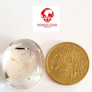 Cabochon Topaas met insluiting Columbite in transparante ovale vorm
