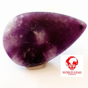 Hermosa pieza de cuarzo con lepidolita inusual para gemólogos, para tener una copia PESO 73.25cts DIM 52x32mm