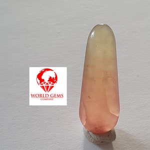 Cabochon de Grenat Hydrogrossulaireà trois couleur  d'Afrique du Sud: rare , pièce unique, pour la collection   POIDS 6.84CTS DIM 22x8MM