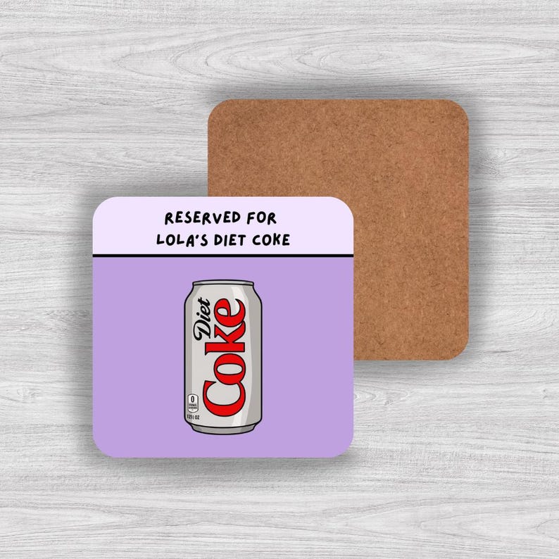 May include: A square coaster with a light purple background featuring a silver Diet Coke can illustration and the black text RESERVED FOR LOLA'S DIET COKE. The coaster has a cork backing and a smooth top surface with rounded corners.