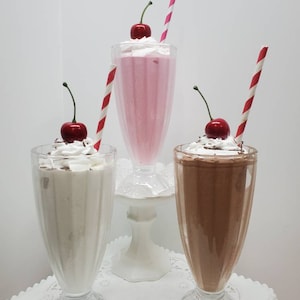 Fake chocolate milkshake fake strawberry milkshake fake vanilla milkshake Retro diner old fashioned ice cream shop