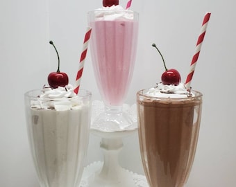 Fake chocolate milkshake fake strawberry milkshake fake vanilla milkshake Retro diner old fashioned ice cream shop