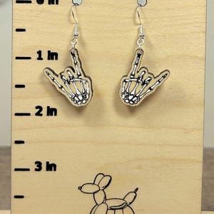 Skeleton Rock On Hand Painted Wood Dangle Earrings