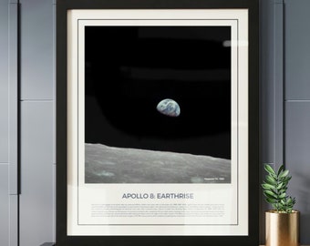 May include: A black framed poster with a photograph of Earthrise over the lunar surface, taken by the Apollo 8 mission on December 24, 1968. The poster includes the text "Apollo 8: Earthrise" and a description of the event.